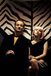 Charlotte (Johansson) and Bob (Murray) share a quiet moment outside a karaoke room.