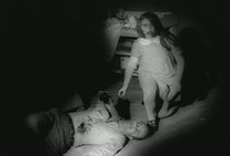 A young zombie and her victim, her father
